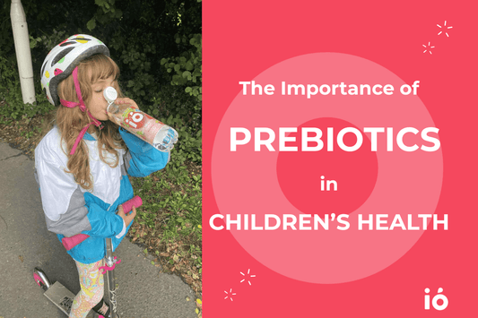 Child drinking prebiotic fibre drink for gut health and immunity support