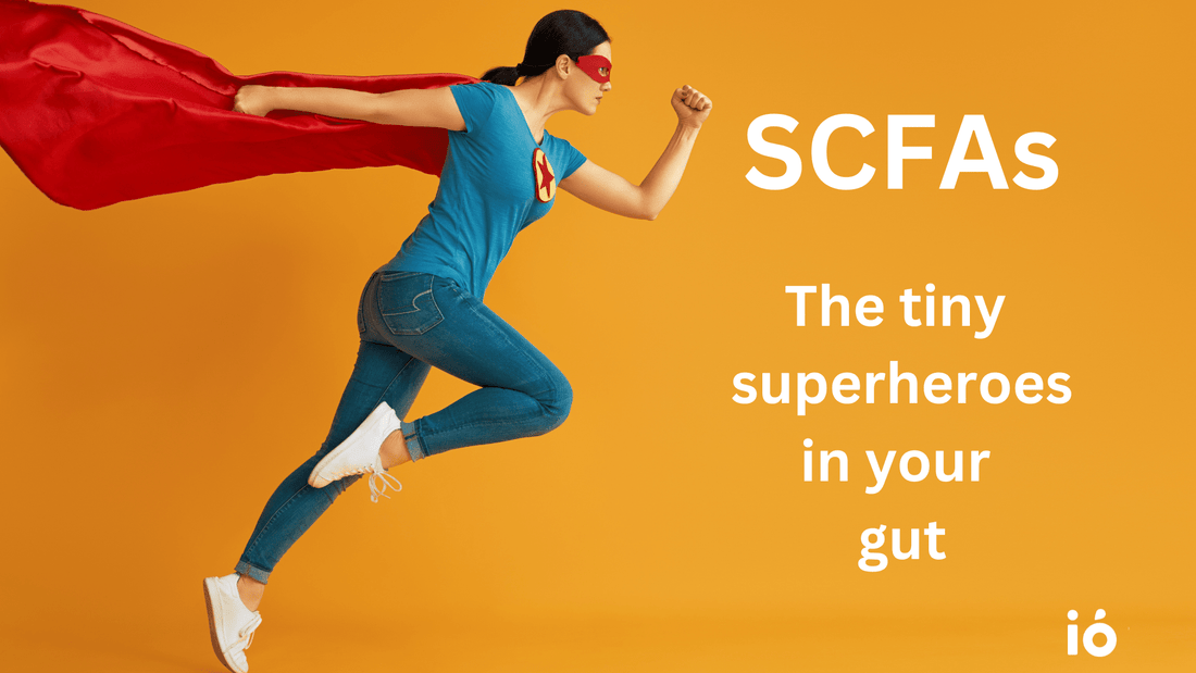 Woman in superhero costume running on orange background representing SCFAs as tiny superheroes that support gut health